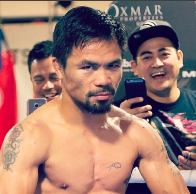 Horn stuns Pacquiao in bloody battle