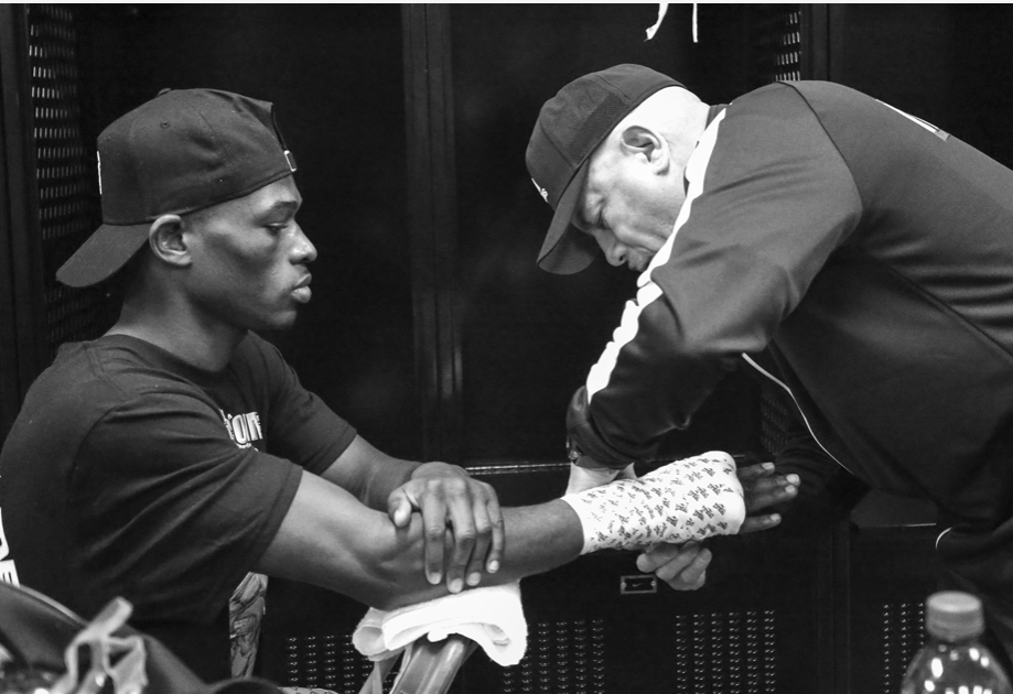 Richard Commey gets his hands wrapped by Gary Stark Sr.  Pic by Mikey Willaims