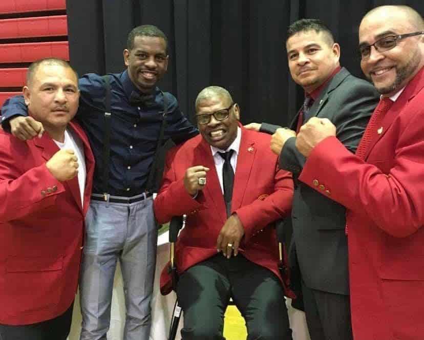 Jamel Herring poses with Leon Spinks. 