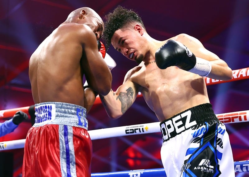 William Encarnacion (left) pushed Adam Lopez to the limit with two knockdowns, but Lopez squeaked out the win. Photo: Mikey Williams/Top Rank Inc via Getty Images Janibek Alimkhanuly Destroys