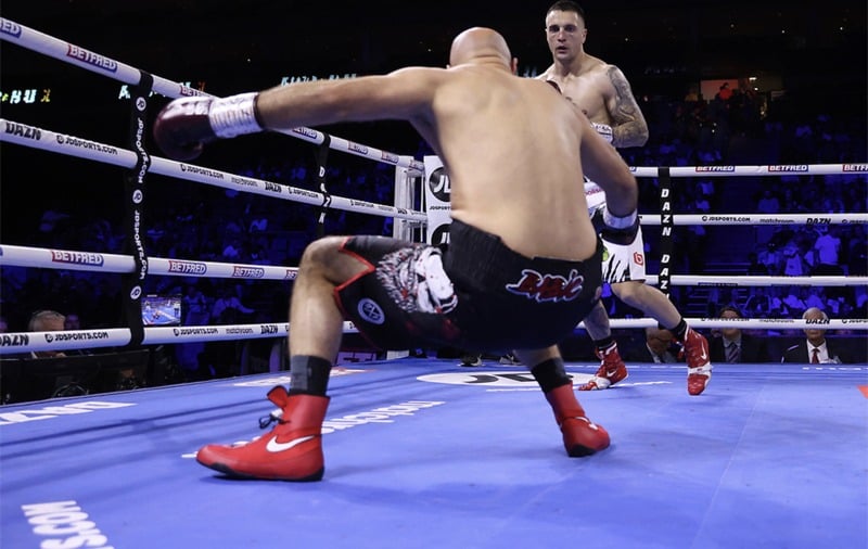 Alen Babic hits the deck in the first round after a left hook to the temple by Adam Balski. Photo: Mark Robinson, Matchroom Boxing