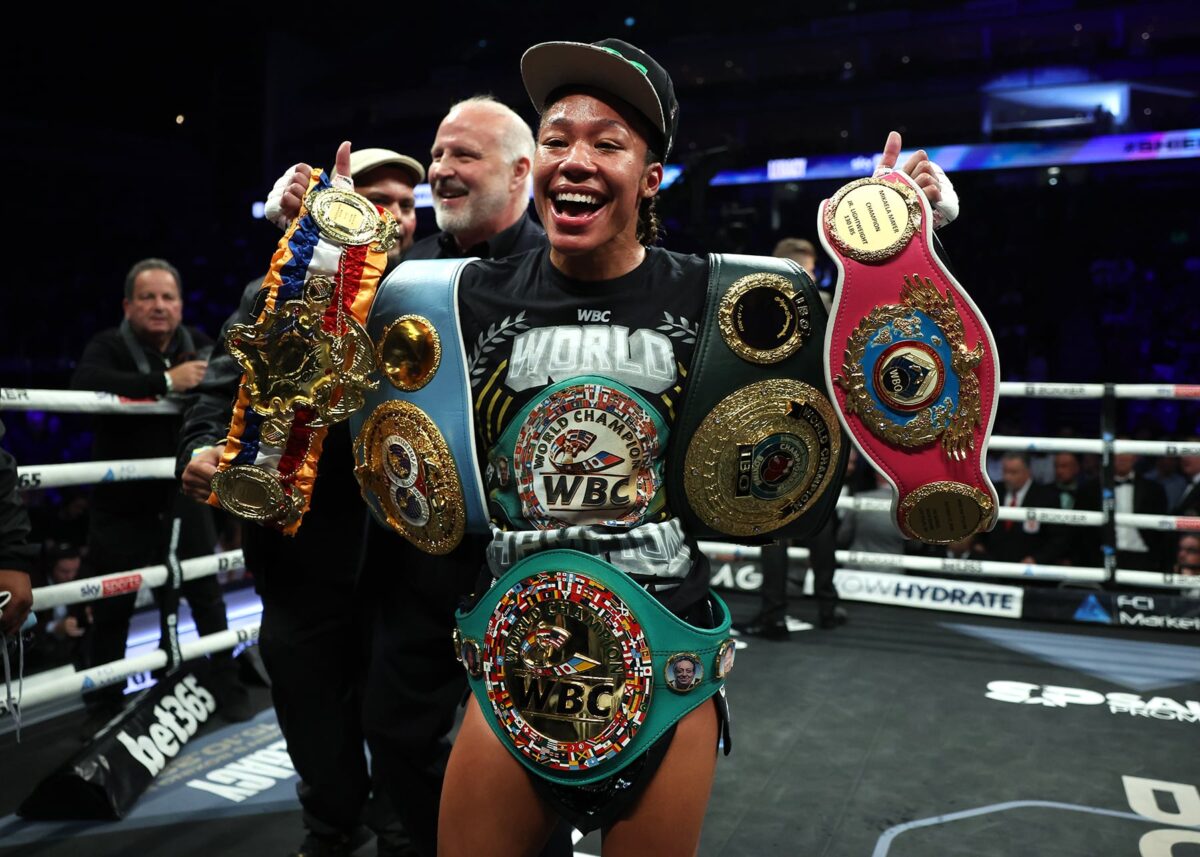 Alycia Baumgardner celebrates after defeating Mikaela Mayer to defend her undisputed super featherweight belts at The 02 Arena on October 15, 2022 in London, England. Photo: Mark Robinson/Top Rank Inc via Getty Images