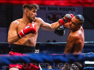 Edel Gomez in action versus Justin Baesman in July 2022