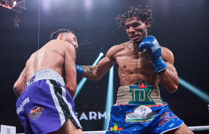 Elvis Rodriguez (right) had to warm up after a year long layoff, taking a majority decision over Joseph Adorno. Photo: Esther Lin, Showtime Boxing