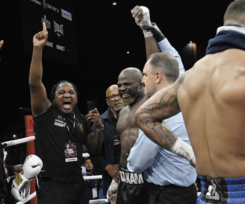 Carlos Takam celebrates the announcement of his majority decision win. Photo: Chris Dean, Boxxer Yoka vs Takam