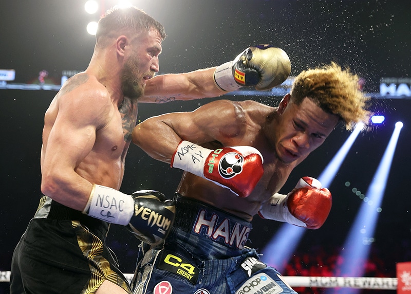 Vasiliy Lomachenko (L) threw and landed more total punches in 12 rounds than Devin Haney. Photo: Mikey Williams/Top Rank Inc via Getty Images