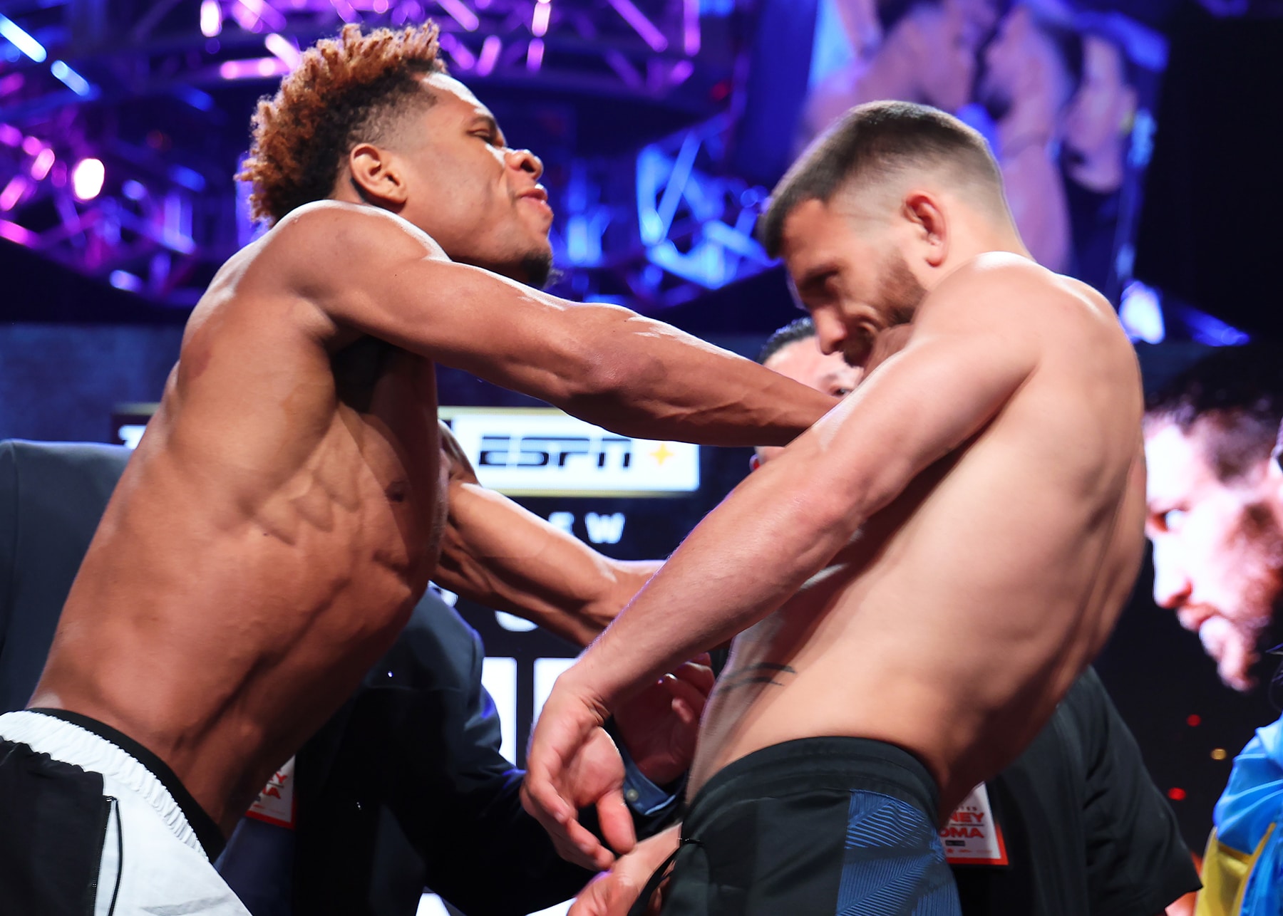 Devin Haney's shove of Vasiliy Lomachenko at the weigh in Friday. Photo: Mikey Williams/Top Rank Inc via Getty Images Haney vs Lomachenko