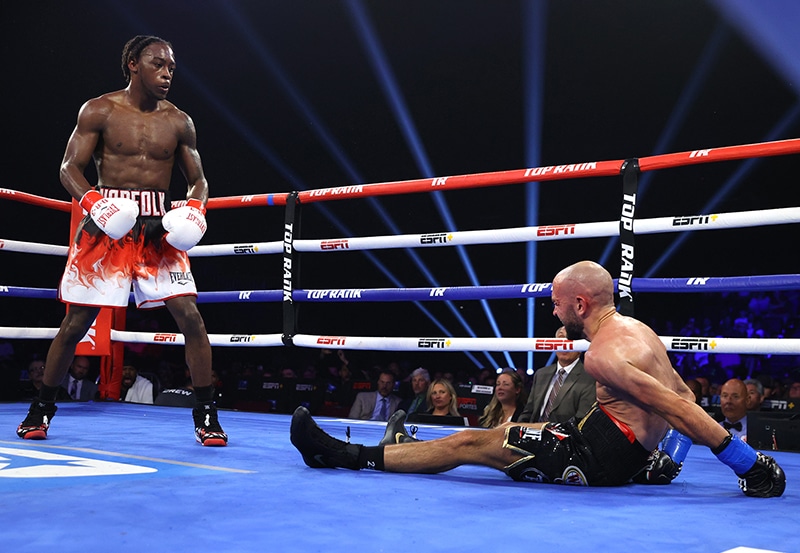 Keyshawn Davis knocked down Francesco Patera in the eighth round, winning a wide decision. Photo: Mikey Williams/Top Rank Inc via Getty Images Kambosos Jr. gets