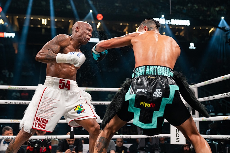 The eye of Yordenis Ugas couldn't stand up to the assault from Mario Barrios. Photo: Ryan Hafey, Premier Boxing Champions