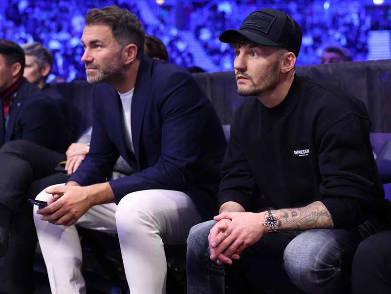 Former Conlan opponent Leigh Wood sits with promoter Eddie Hearn in support of Jordan Gill. Photo: Mark Robinson, Matchroom Boxing Conlan vs Gill