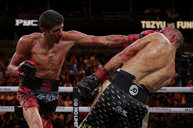 As the fight wore on, the bloody scene was hard to process for the fans. Photo: Esther Lin, Premier Boxing Champions