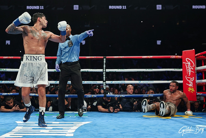 Ryan Garcia checks to see if Devin Haney can survive the third knockdown of the fight. Photo: Cris Esqueda, Golden Boy Boxing