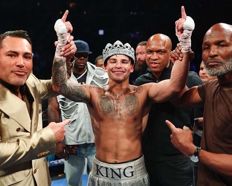 Oscar De La Hoya, Derrick James, and Bernard Hopkins celebrate Ryan Garcia's victory. Photo: Cris Esqueda, Golden Boy Boxing