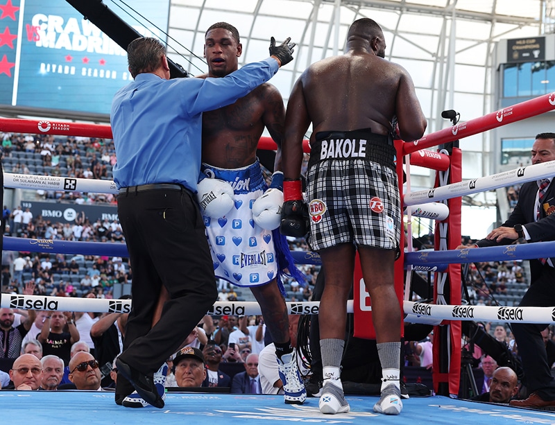 After taking too much punishment, referee Jerry Cantu had seen enough. Martin Bakole wins the NABF, WBO International Heavyweight Title. Photo: Mark Robinson, Matchroom Boxing