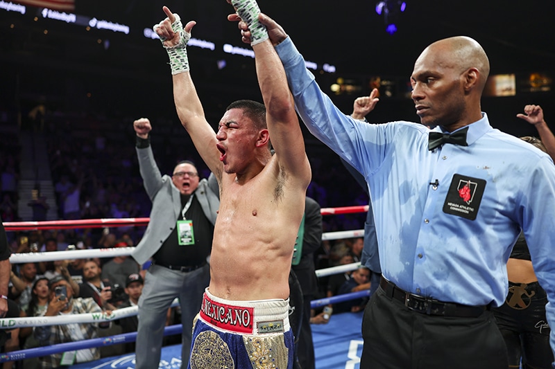 Vergil Ortiz Jr. reacts to the scorecards, and hearing "And new!" Photo: Cris Esqueda, Golden Boy Boxing