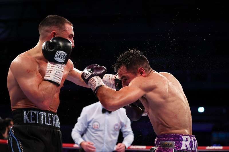 Despite giving up six inches in height to Ronny Rios, Nick Ball had no issues laying leather on his opponent. Photo: Queensberry Boxing