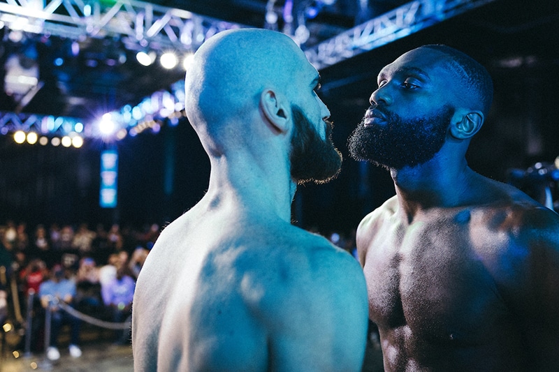 Jaron ‘Boots’ Ennis and Karen Chukhadzhian faceoff at their weigh In Friday. Photo: Amanda Westcott, Matchroom Boxing Boots Ennis