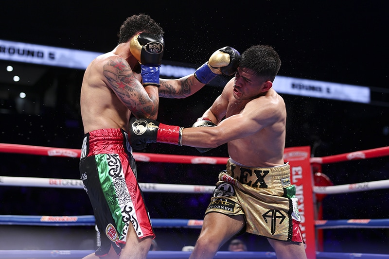 Alexis Rocha used his speed and movement to land solid body shots on Raul Curiel. Photo: Cris Esqueda, Golden Boy Boxing