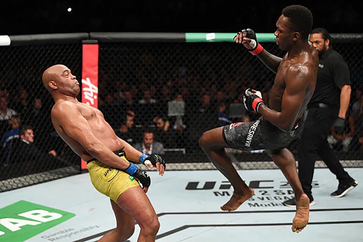 Anderson Silva of Brazil fights Israel Adesanya of New Zealand in their middleweight bout during the UFC 234 at Rod Laver Arena on February 10, 2019 in the Melbourne, Australia. Photo: Jeff Bottari/Zuffa LLC/Zuffa LLC via Getty Images)