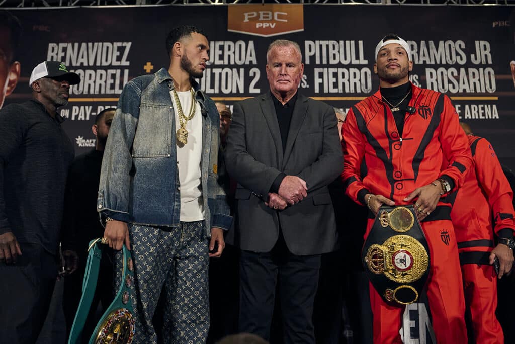 David Benavidez and David Morrell Jr. pose on stage after their heated news conference on Thursday, kept at a safe distance by TGB president Tom Brown. Photo: Esther Lin, Premier Boxing Champions monster