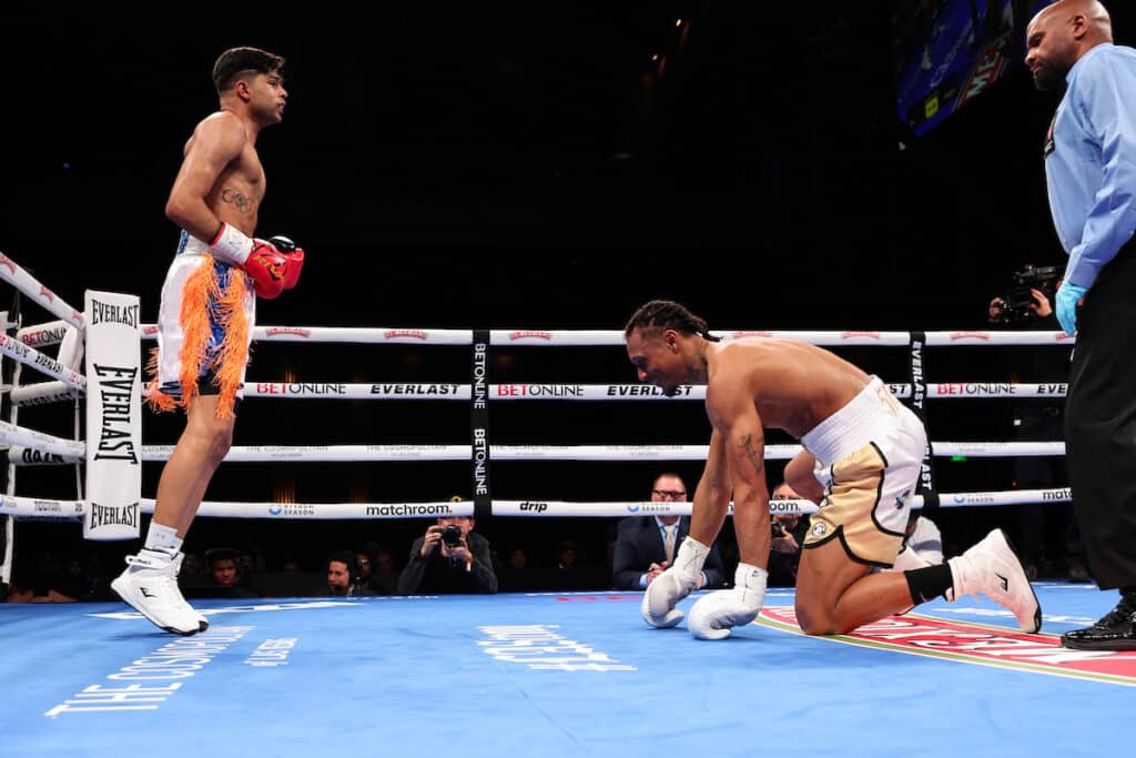 Nishant Dev knocks down Alton Wiggins during their middleweight fight on Saturday. Photo: Melina Pizano/Matchroom