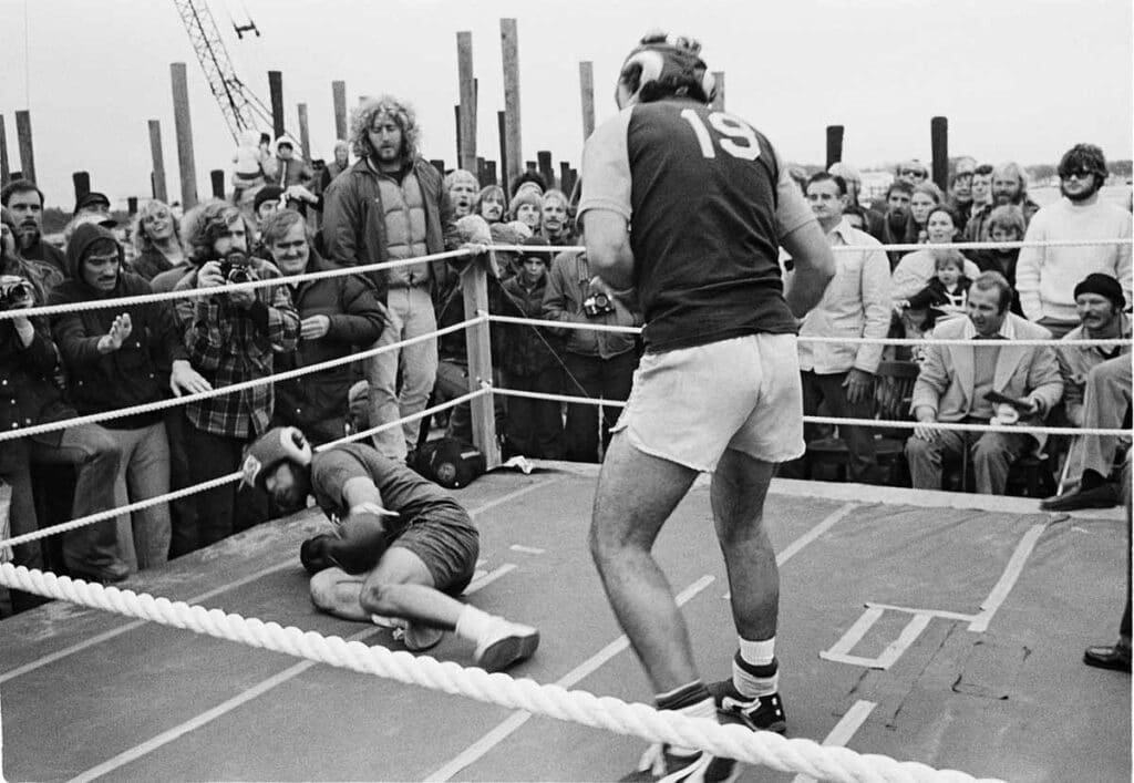 Tom McInerney stands over Bobby Izenburg after a knockdown. Photo: Tom Watson