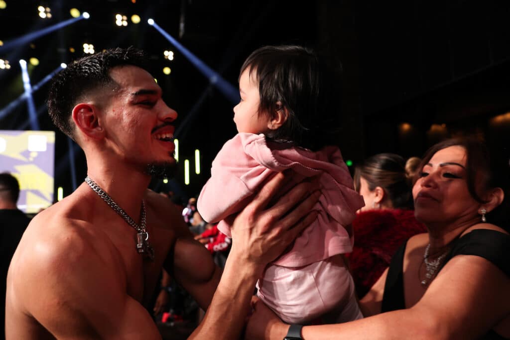 Diego Pacheco celebrates with his daughter Divine Pacheco after winning his USWBC and WBO International super middleweight title fight on Saturday. Photo: Melina Pizano/Matchroom