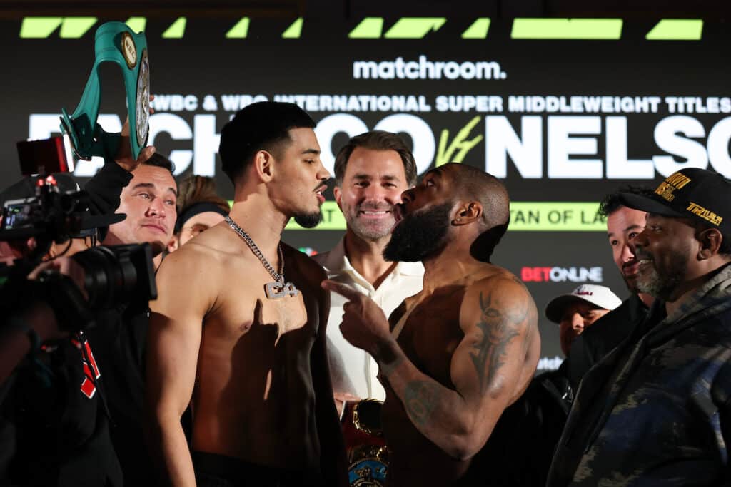 Steve Nelson, egged on by trainer Brian McIntyre, gives Diego Pacheco the business at their weigh-in. Can he do it in the ring Saturday? Photo: Melina Pizano, Matchroom