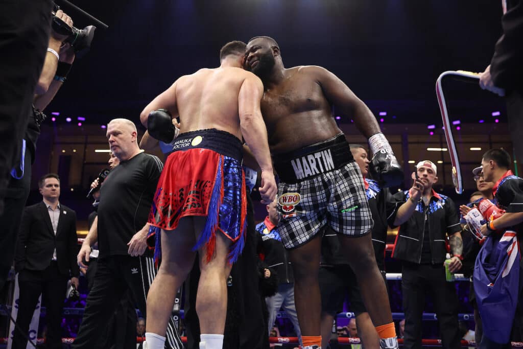 Martin Bakole congratulates Joseph Parker for his win, retaining his WBO interim heavyweight title. Photo: Mark Robinson, Matchroom Boxing