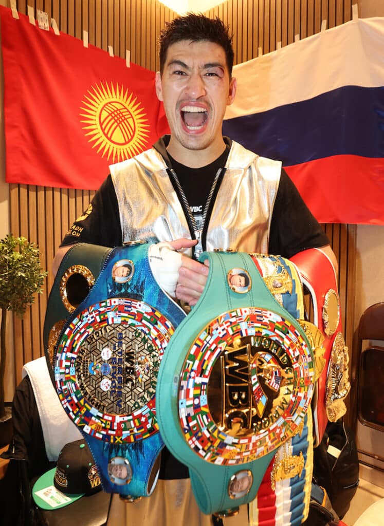 And the new: Dmitry Bivol is the IBF, WBC, WBA and WBO Undisputed Light Heavyweight champion of the world. Photo: Mark Robinson Matchroom Boxing.  
Dmitrii Bivol celebrates his win with all the belts. Photo: Mark Robinson, Matchroom Boxing