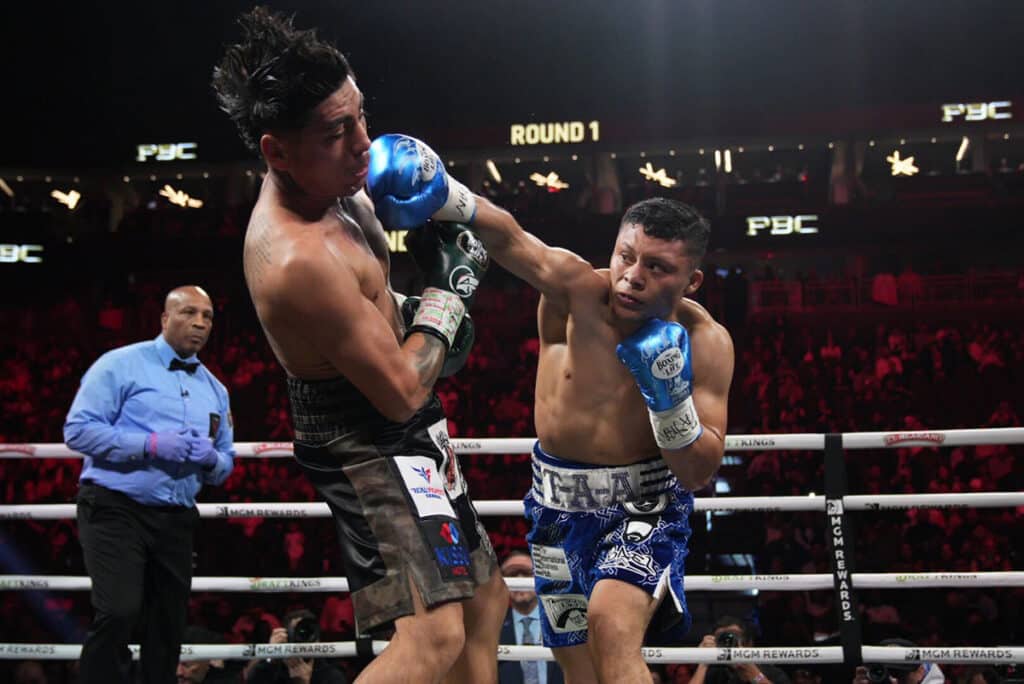 Isaac "Pitbull" Cruz kept his career on track with a hard-fought win over Angel Fierro in ten wild rounds. Photo: Esther Lin, Premier Boxing Champions