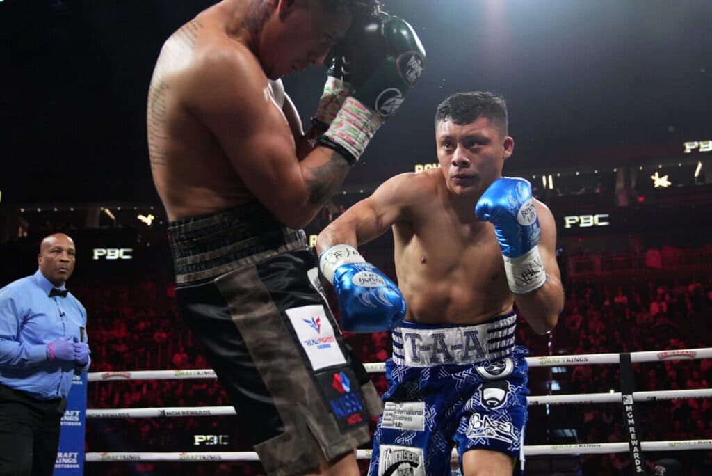 More than 1,400 punches were thrown in ten rounds by Issac Cruz and Angel Fierro. Photo: Esther Lin, Premier Boxing Champions