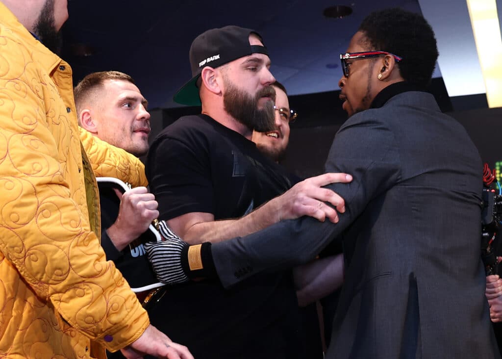 After the faceoff, Keyshawn Davis and Denys Berinchyk needed to be separated. Photo: Mikey Williams, Top Rank Boxing