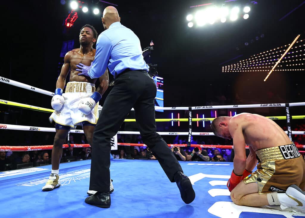 Keyshawn Davis reacts as he goes to the neutral corner following the fourth round knockdown of Denys Berinchyk. Photo: Mikey Williams, Top Rank Boxing