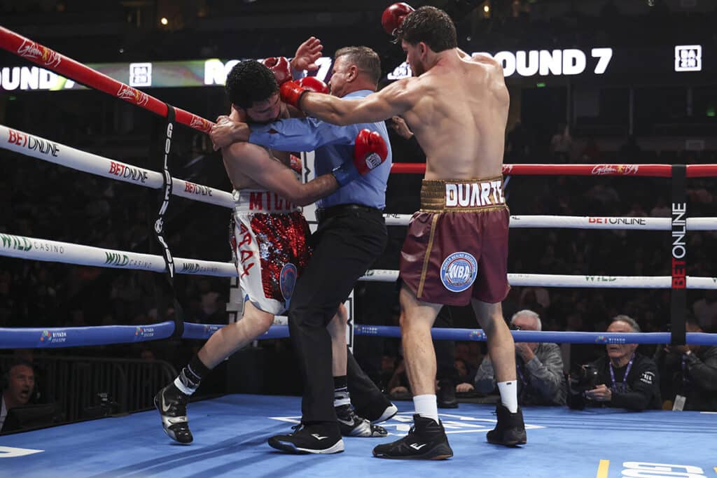 Referee Thomas Taylor stepped in to prevent Miguel Madueño from taking any more punishment in the seventh round. Photo: Cris Esqueda, Golden Boy Boxing