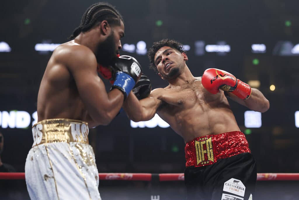 Darius Fulghum made Winfred Harris Jr. pay for making it a rough inside fight. Photo: Cris Esqueda, Golden Boy Boxing