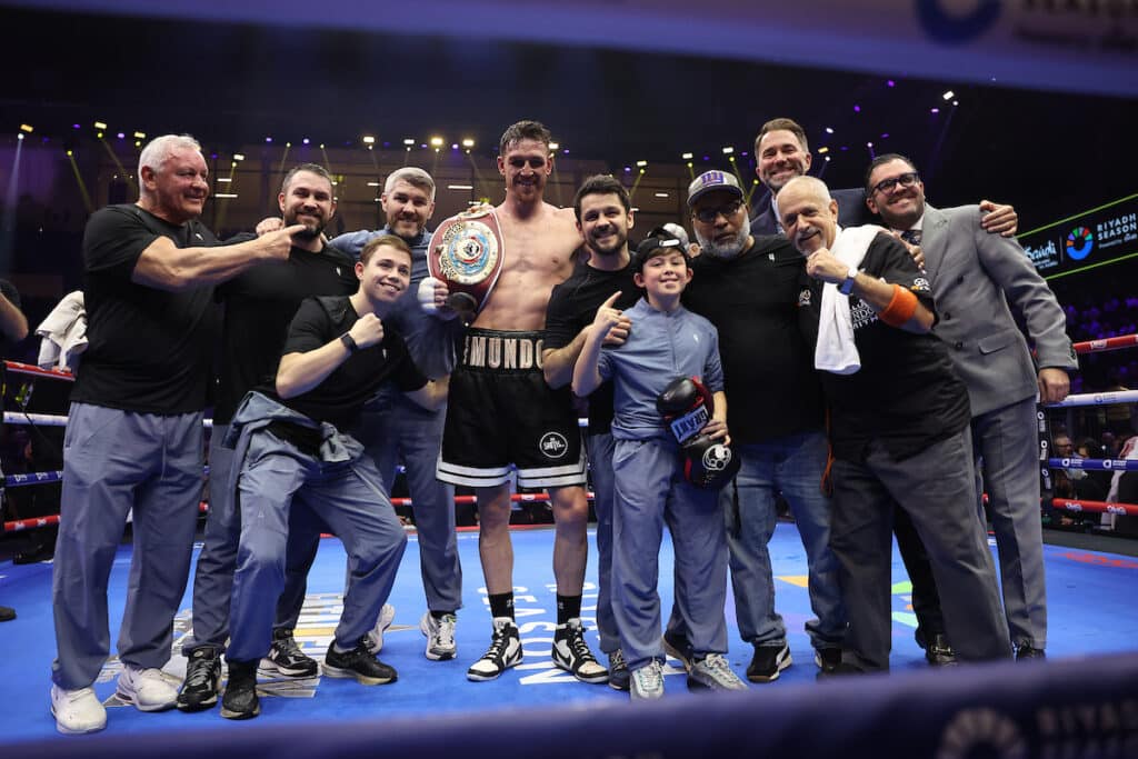 Callum Smith celebrates his victory with his team including trainer and his fighting brothers Liam, Paul, and Stephen. Photo: Mark Robinson, Matchroom Boxing