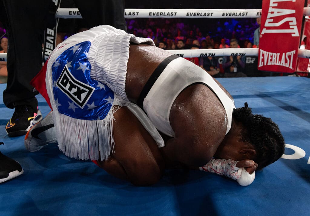 An emotional Tiara Brown fell to the canvas hearing the third scorecard and learning she had won. Photo: Matchroom Boxing