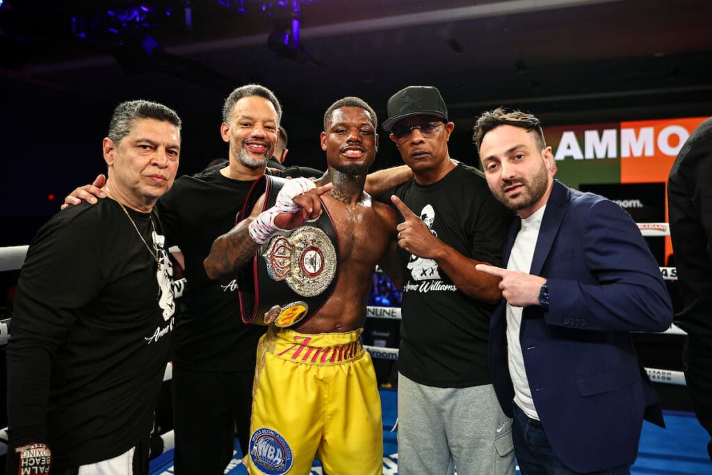 Austin Williams with trainer Kevin Cunningham and his team after his victory over Patrice Volny. Photo: Melina Pizano, Matchroom