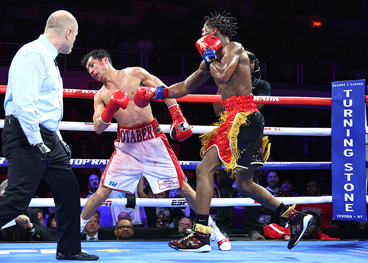 In a stunning turnaround, Raymond Ford stopped Otabek Kholmatov with just seven seconds left in their 2024 Fight of the Year. Photo: Mark Robinson, Matchroom Boxing