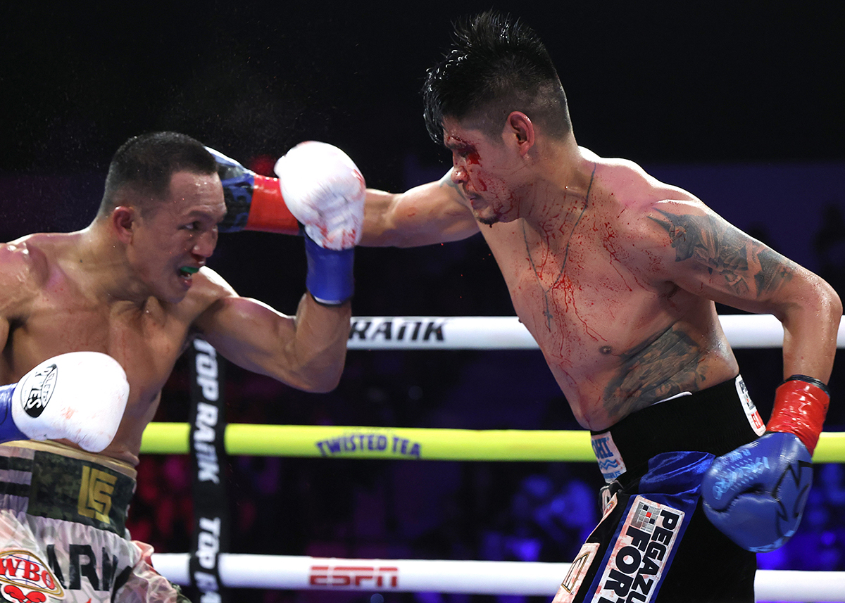 Emanuel Navarrete was fortunate to get a win after a vicious cut in his fight last May against Charly Suarez. Photo: Mikey Williams, Top Rank Boxing Navarrete vs Nunez