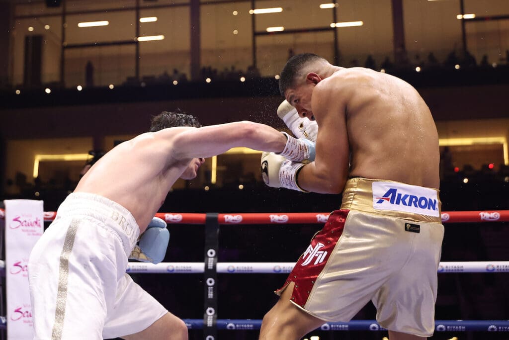 Jaime Munguia showed improved defensive skills, staying clear of the overhand right from Bruno Serace. Photo: Leigh Dawney/Queensberry
