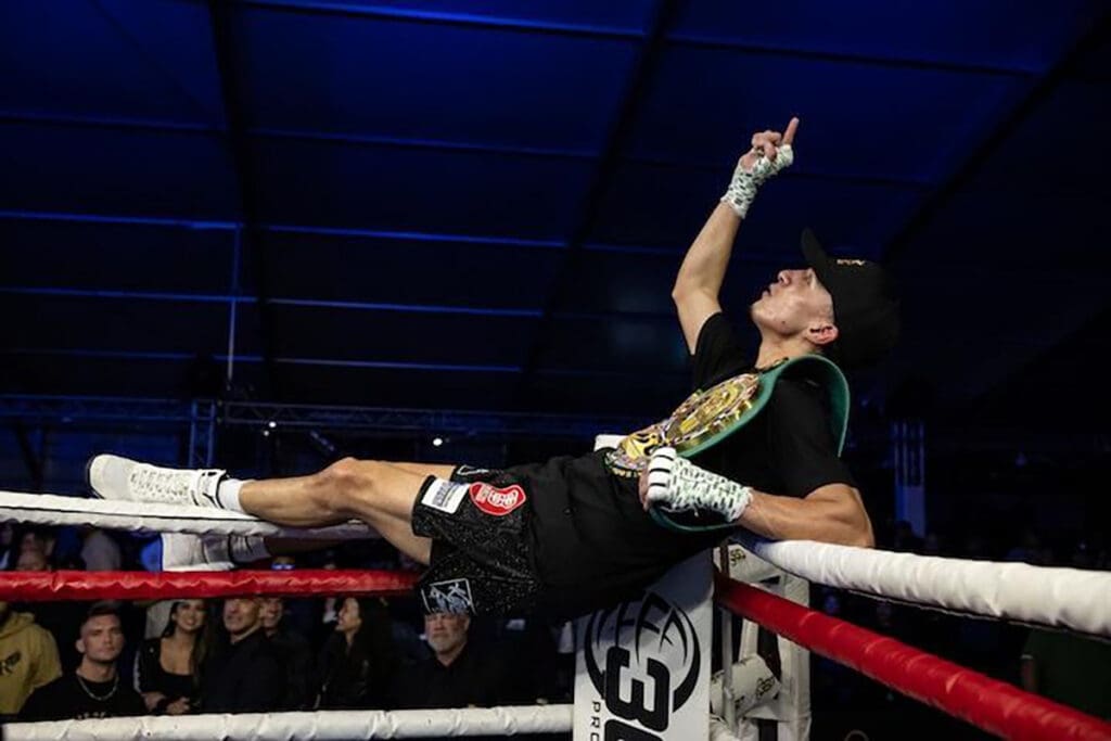 After every victory, Omar Trinidad entertains the fans with a tribute to wrestling legend Eddie Guerrero by kicking his feet up and laying on the top ropes, imitating the wrestler's iconic moves. Photo: Lina Baker, 360 Promotions