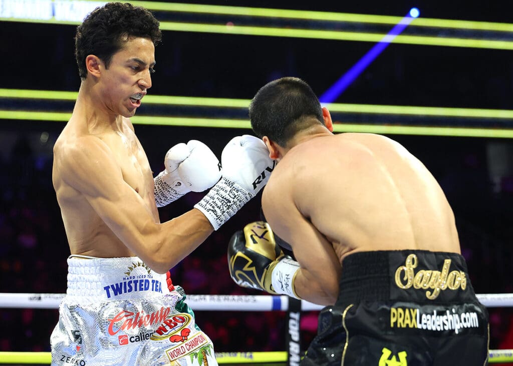 Featherweight champion Rafael Espinoza had too much firepower for Edward Vazquez. Photo: Mikey Williams, Top Rank Boxing