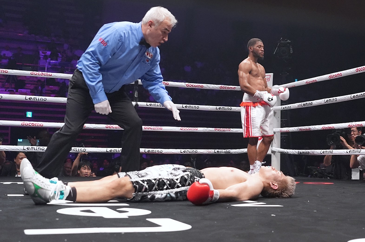 Jin Sasaki was out cold when he hit the canvas in the fifth round to end the fight with a Knockout of the Year. Photo: Naoki Fukuda