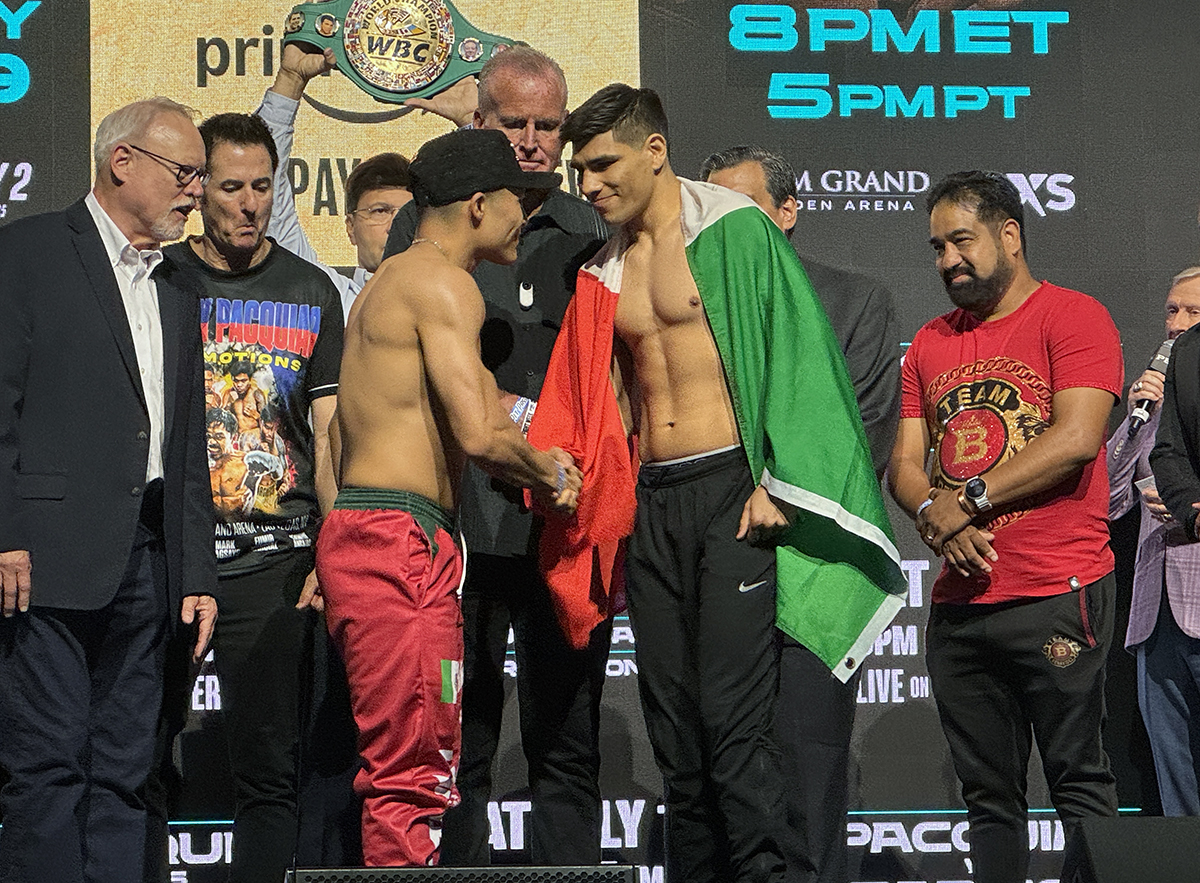 Issac Cruz shows his gratitude to Omar Salcido for stepping in at the last minute to replace Angel Fierro. Photo: Gayle Falkenthal, NY FIghts Manny Pacquiao