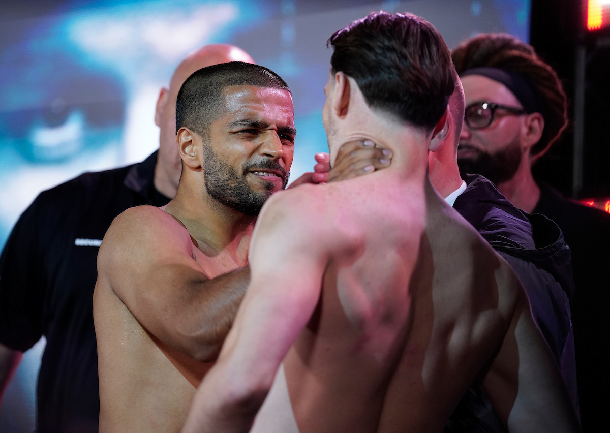 Aqib Fiaz got a little spicy, grabbing fellow Manchester fighter Alex Murphy at the weigh-in. Photo: Dave Thompson, Matchroom Boxing Catterall vs Eubank