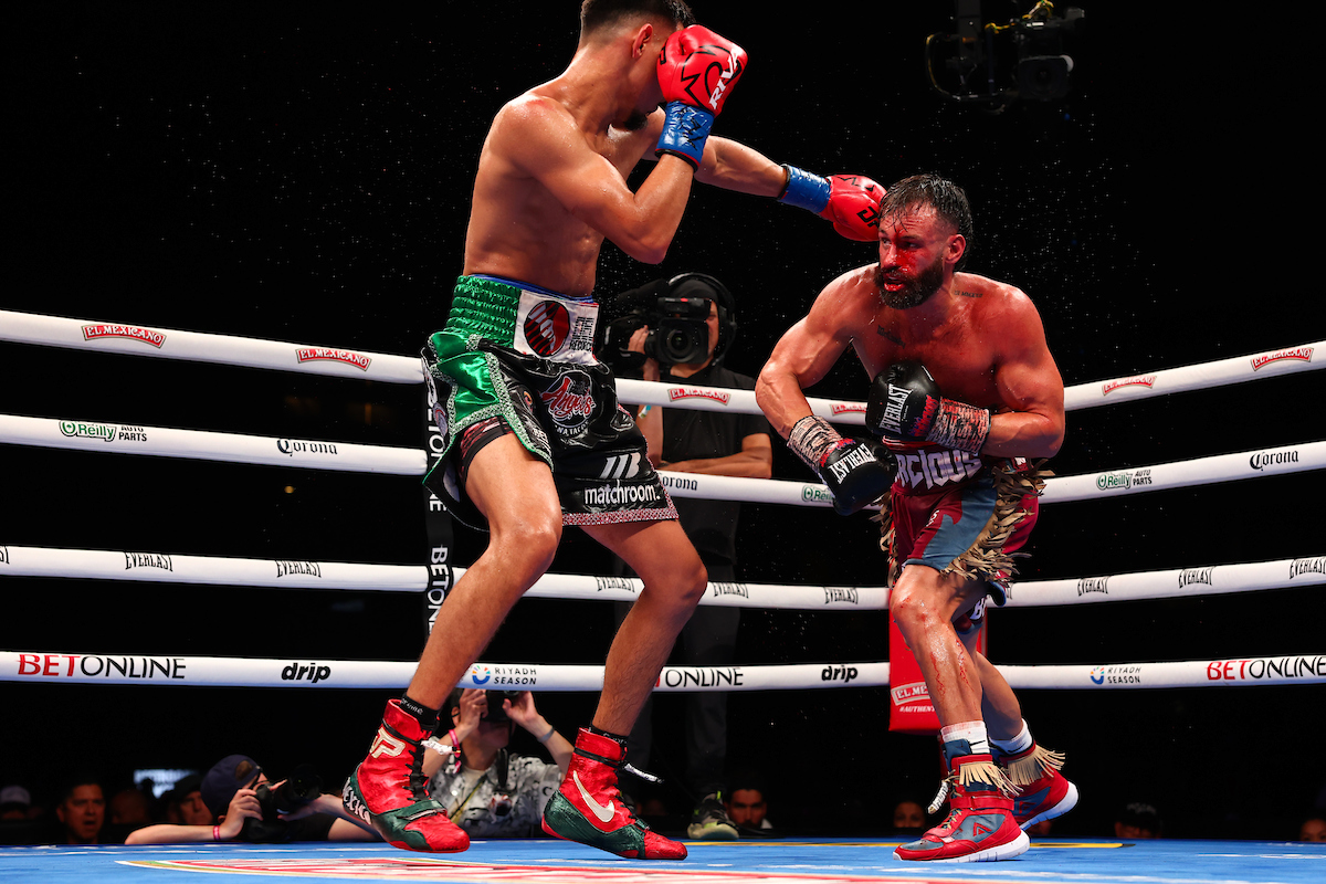 Diego Pacheco and Trevor McCumby fought a bloody battle. Photo: Melina Pizano/ Matchroom Bam Rodriguez