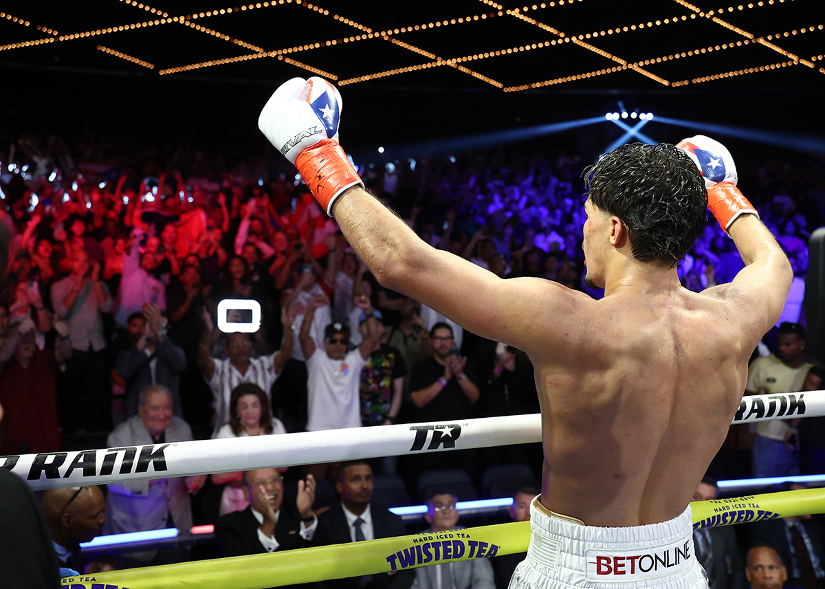 Xander Zayas saluted his Puerto Rican fans at MSG, including his family and champions Amanda Serrano and Subriel Matias. Photo: Mikey Williams, Top Rank Boxing