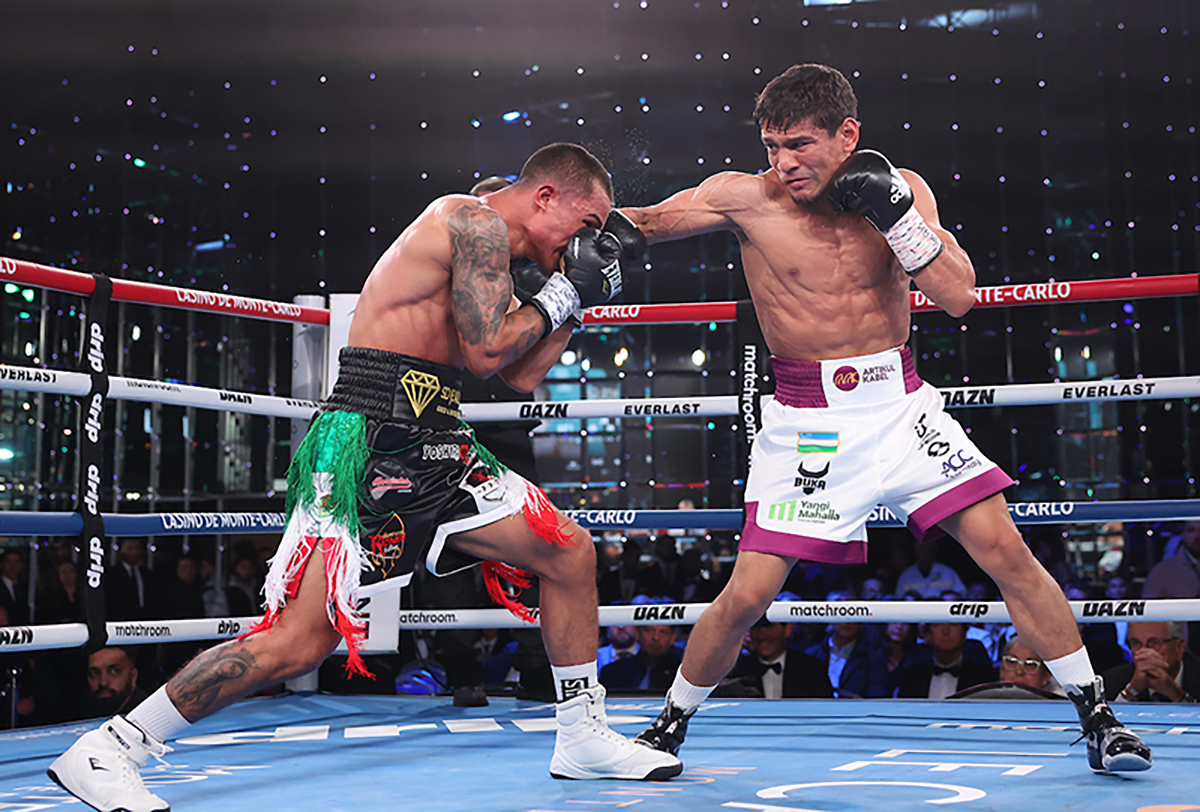 Murodjon Akhmadaliev's southpaw jab, seen here against Ricardo Espinoza in December, will be an asset against Naoya Inoue. Photo: Mark Robinson, Matchroom Boxing